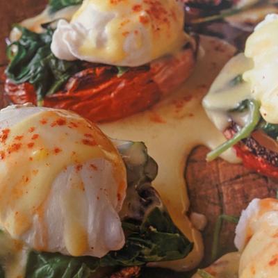 Farmhouse Benedict with Bacon, Greens, Tomato, Poached Egg and Hollandaise