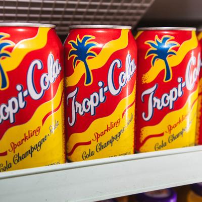 Cans of Cola Champagne soda.