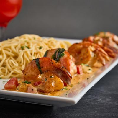 Shrimp Scampi, with roasted garlic, tomatoes, basil, lemon butter, and Angel Hair pasta.