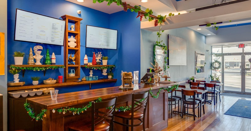 Interior, wooden counter with bar stools