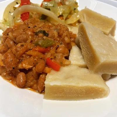 Boiled yam served with baked beans and saltfish.