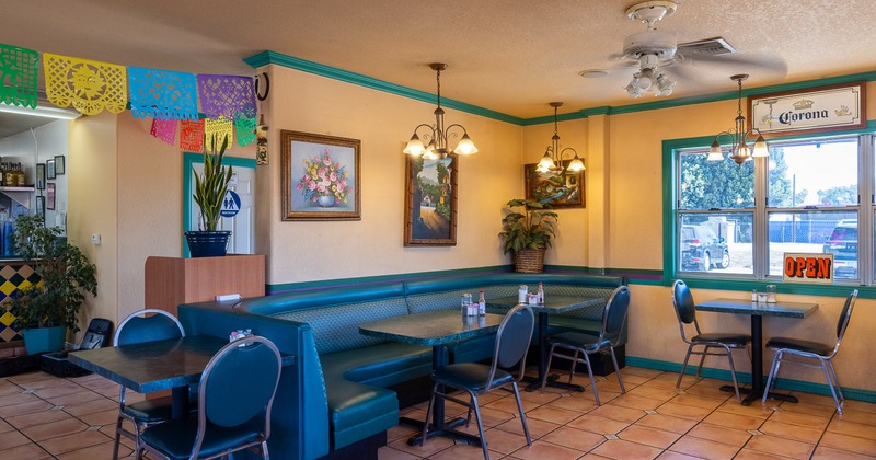 Cozy interior dining area decorated with hanging paper ornaments