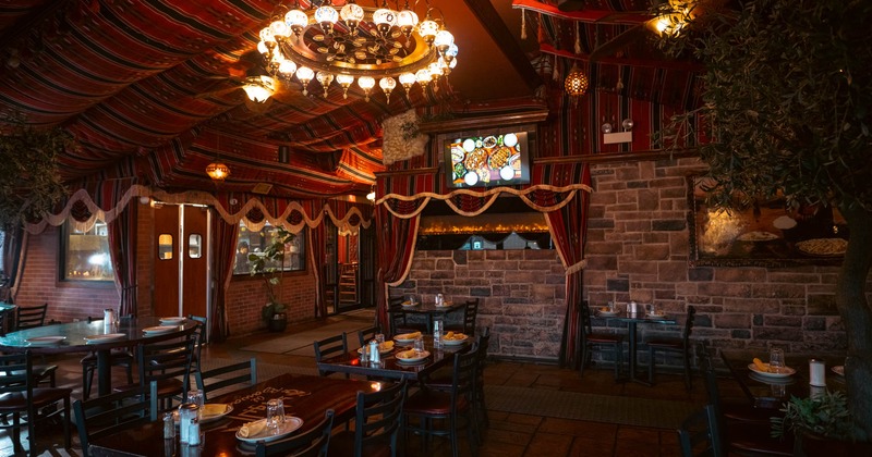 Interior, seating area, Oriental decoration, stone wall, olive tree, kitchen entrance