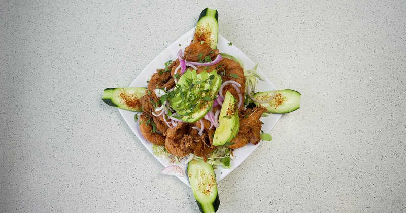 Fried shrimp, with avocado, red onion, cilantro, and cucumber