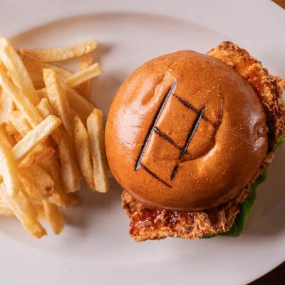 Crispy Chicken Sandwich and fries, top view.