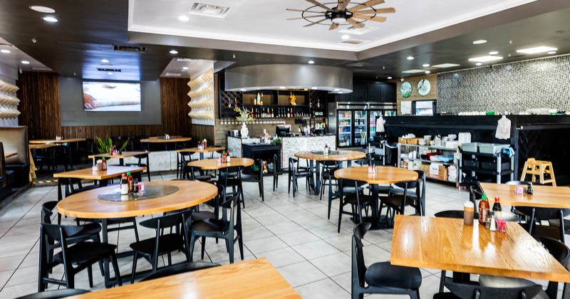 Interior, seating area with rounded tables