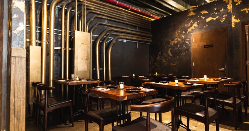 Interior, seating area with set tables waiting to receive guests