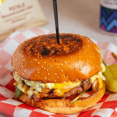 Smoky mushroom burger, served.