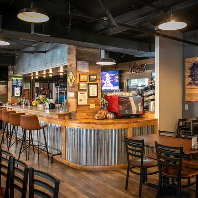 The interior, the bar counter, stools.