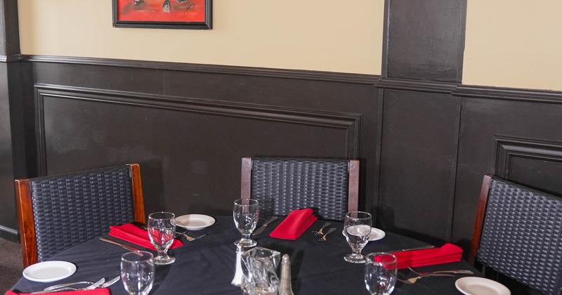 Interior, round tables with tableware