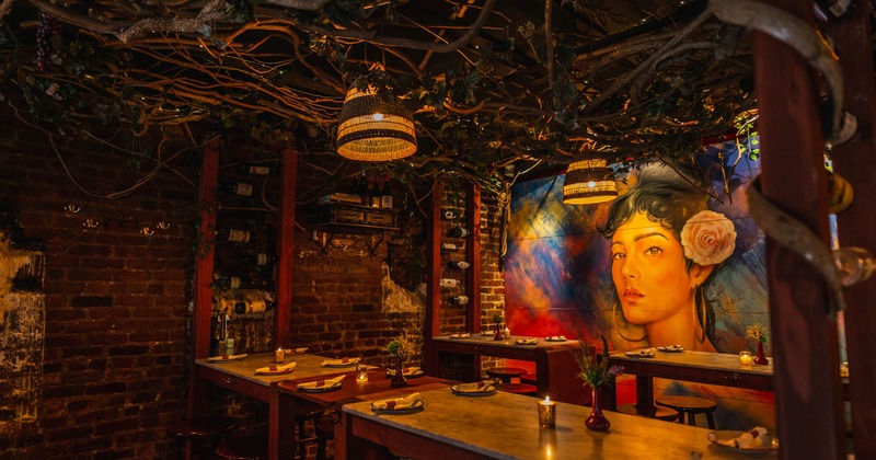 Dining area with mural on wall