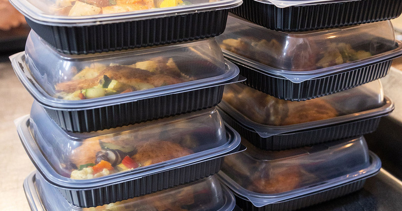 Food in plastic containers, ready to be delivered