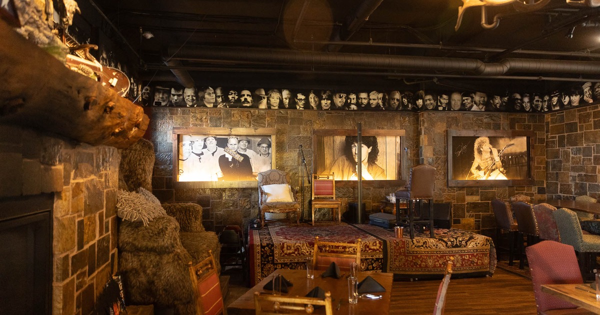 Seating by fireplace with decorated walls