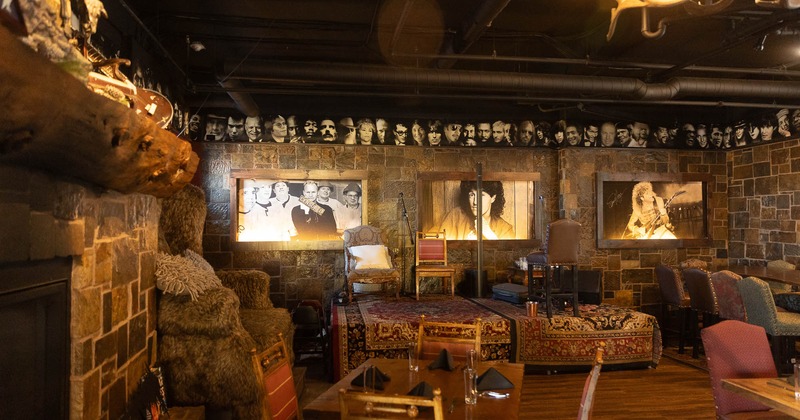 Seating by fireplace with decorated walls