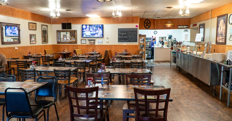 Spacious and cozy interior dining area, order counter and buffet table