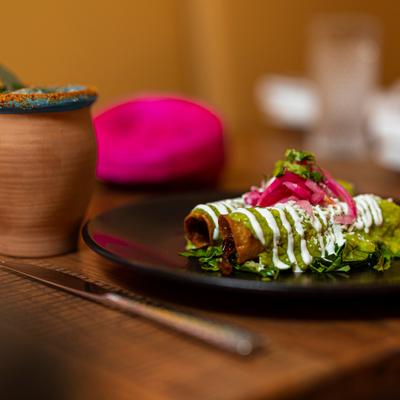 A served meal and a drink.