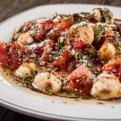 Salad of fresh mozzarella with tomatoes and basil.