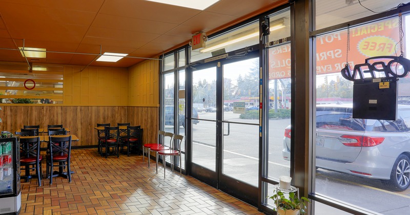 Interior, entrance, window to parking lot