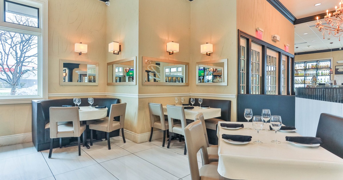 Interior, tables and chairs in dining area