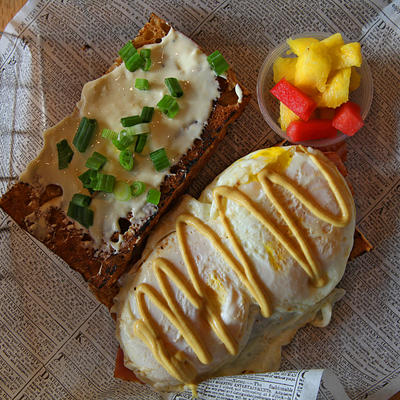 Egg and mustard sandwich with cream and spring onions