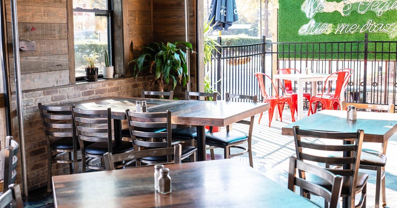 Interior, seating area, tables ready for guests