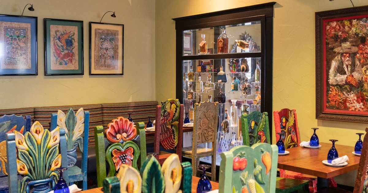 Dining area, liquor cabinet in the background