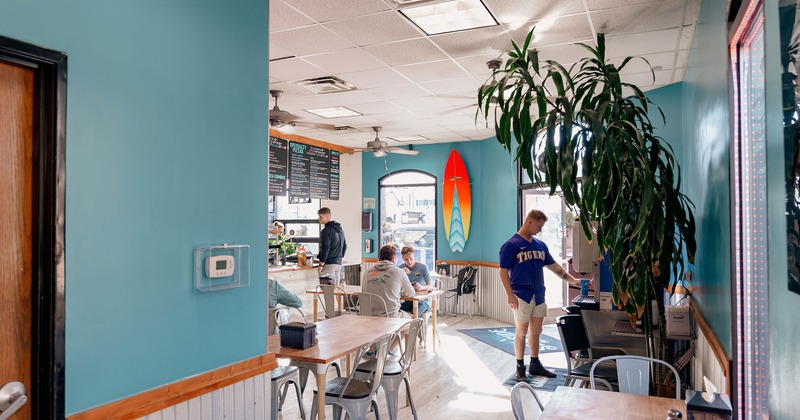 Restaurant interior, seating space in front of order counter