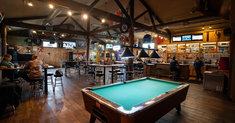 Interior, seating area with a pool table