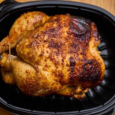 Rotisserie whole chicken, top view.