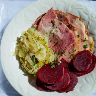 Black oak ham with sides of cabbage and beetroot.