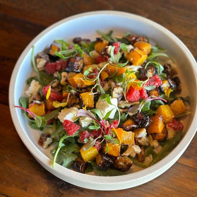 Fall Salad, arugula, roasted butternut squash, pomegranate, feta, candied walnut, white balsamic vinaigrette.