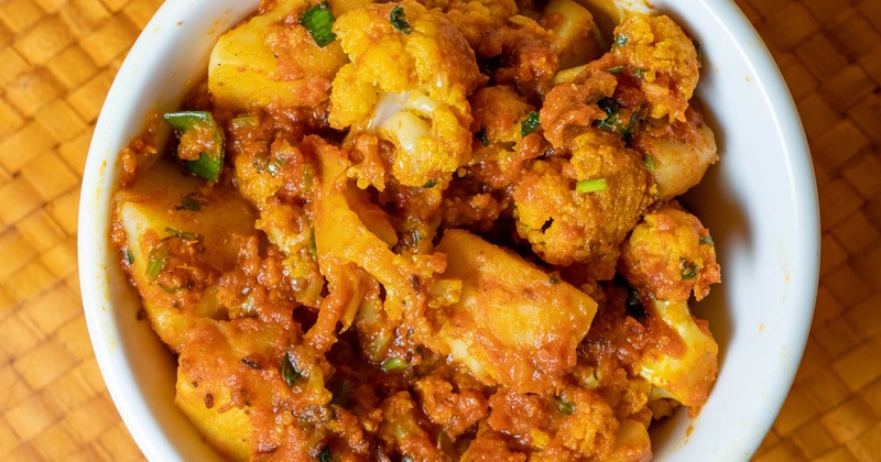 Cauliflower and potato sauteed with onions, cumin seed, and mild spices