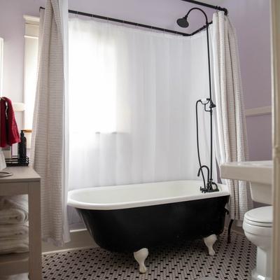 Bathtub with a shower.