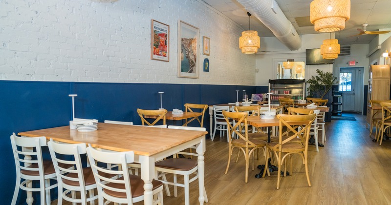 Cozy dining area, tables ready for guests
