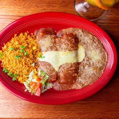 Chicken Tamales, rice, refried beans.