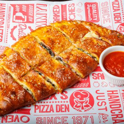 Deluxe stromboli served with marinara sauce.