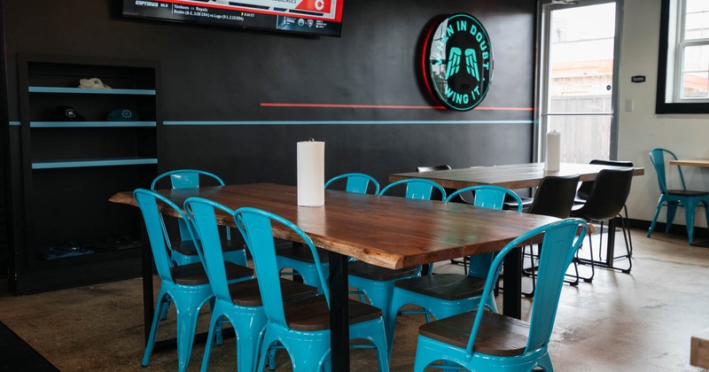 Interior, large table and blue chairs