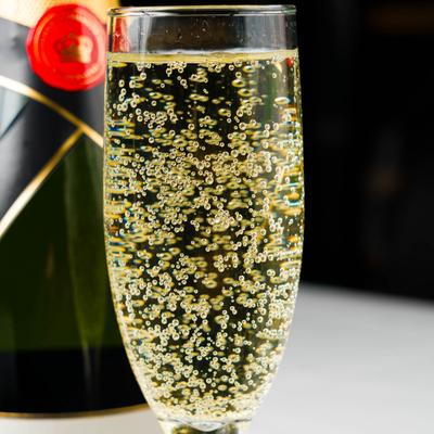 Glass of sparkling wine, close-up.