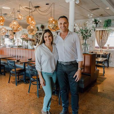 Couple posing inside the restaurant.