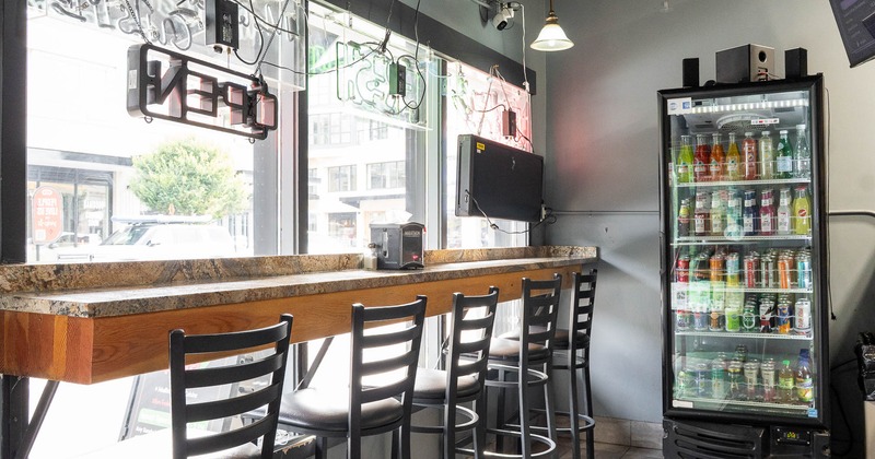 Diner bar table by window, stools