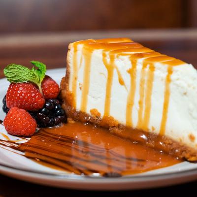 Caramel cheesecake, with berries on the side.