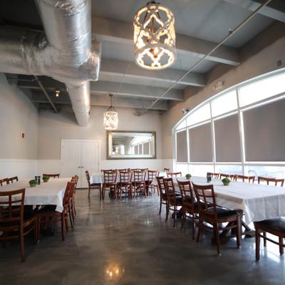 Interior, tables and chairs ready for guests.