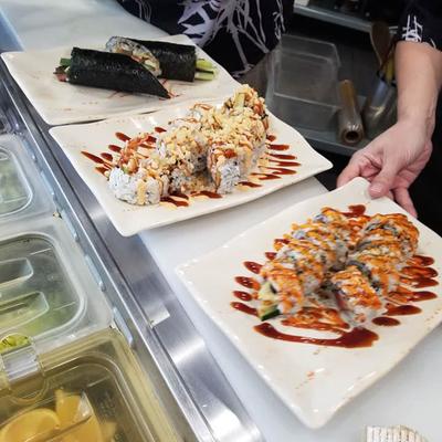 Staff members serving food