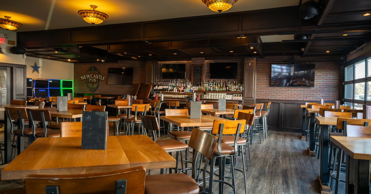 Interior, seating space with wooden tables and chairs