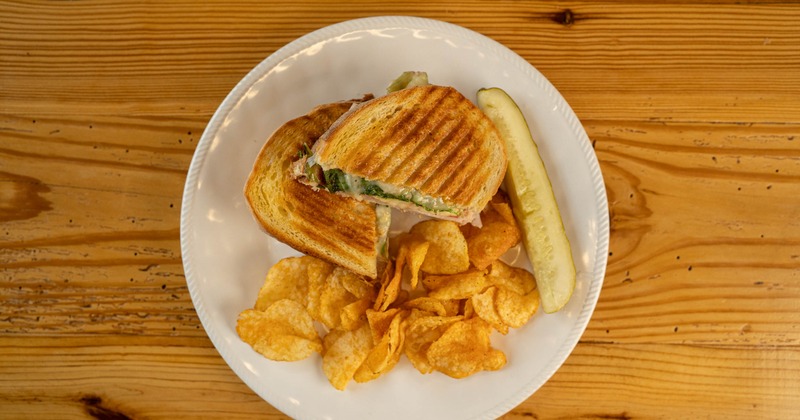 Turkey sandwich served with potato chips