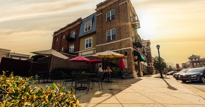 Exterior, front view, entrance, seating place, in front, chairs and tables, parasols