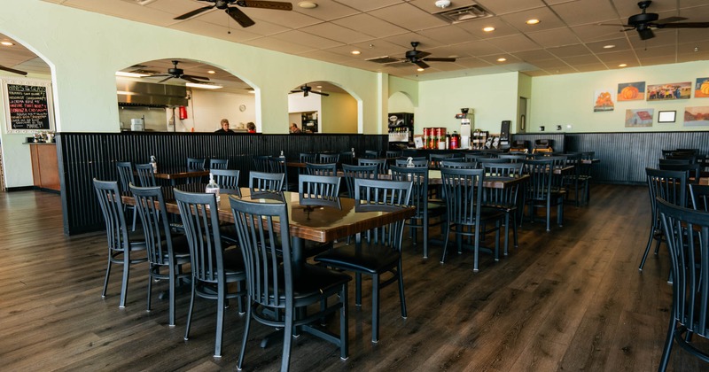 Interior dining area, long table and chairs