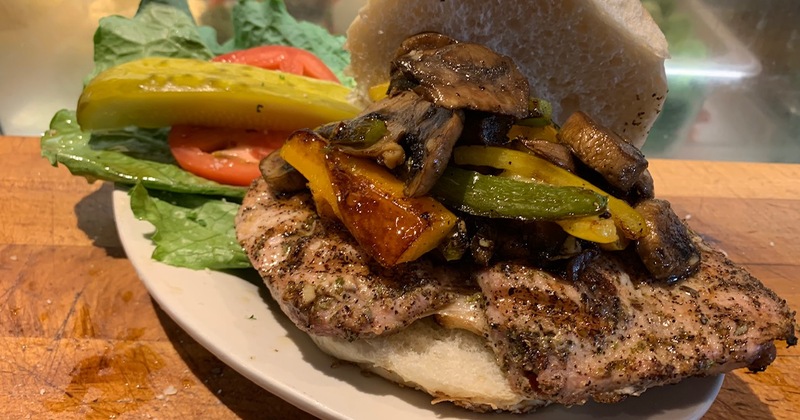 Grilled meat and mushrooms sandwich