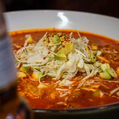 Chicken Pozole soup, with cabbage, and avocado.