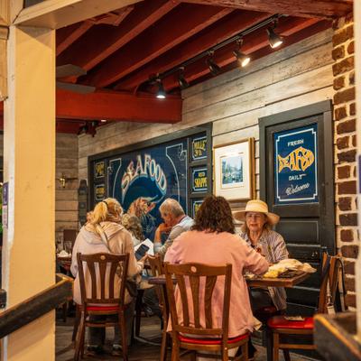 Customers sitting at the tables.